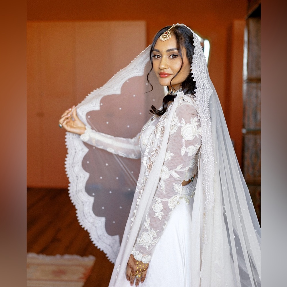 Indian ivory bridal or reception dress.